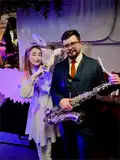 Артист в костюме Ангела с крыльями и душевным поздравлением АНГЕЛ
